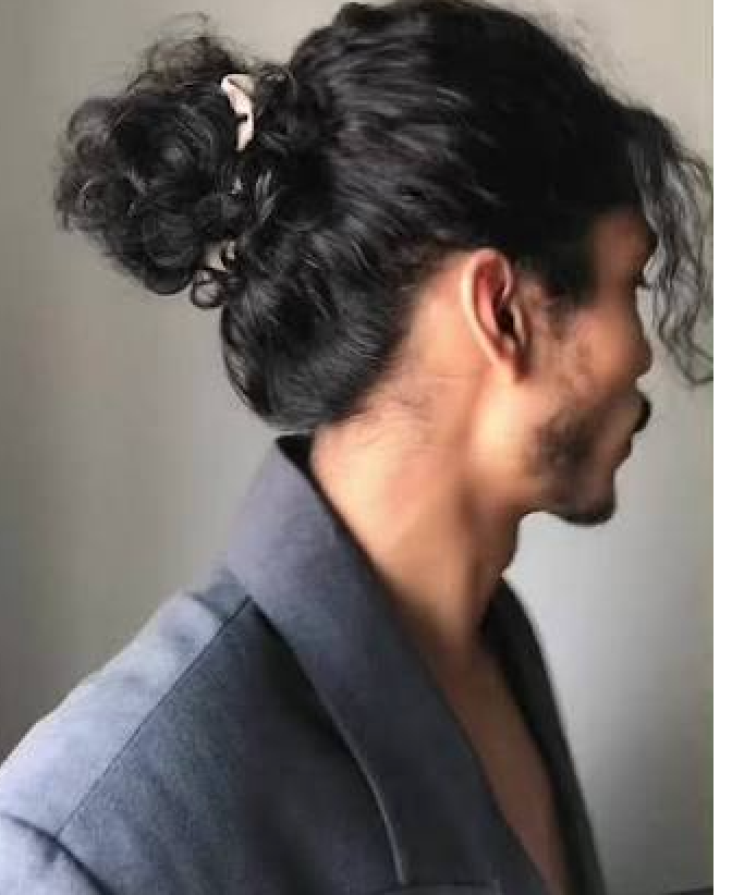 Confident man with man bun — SoieScents for him