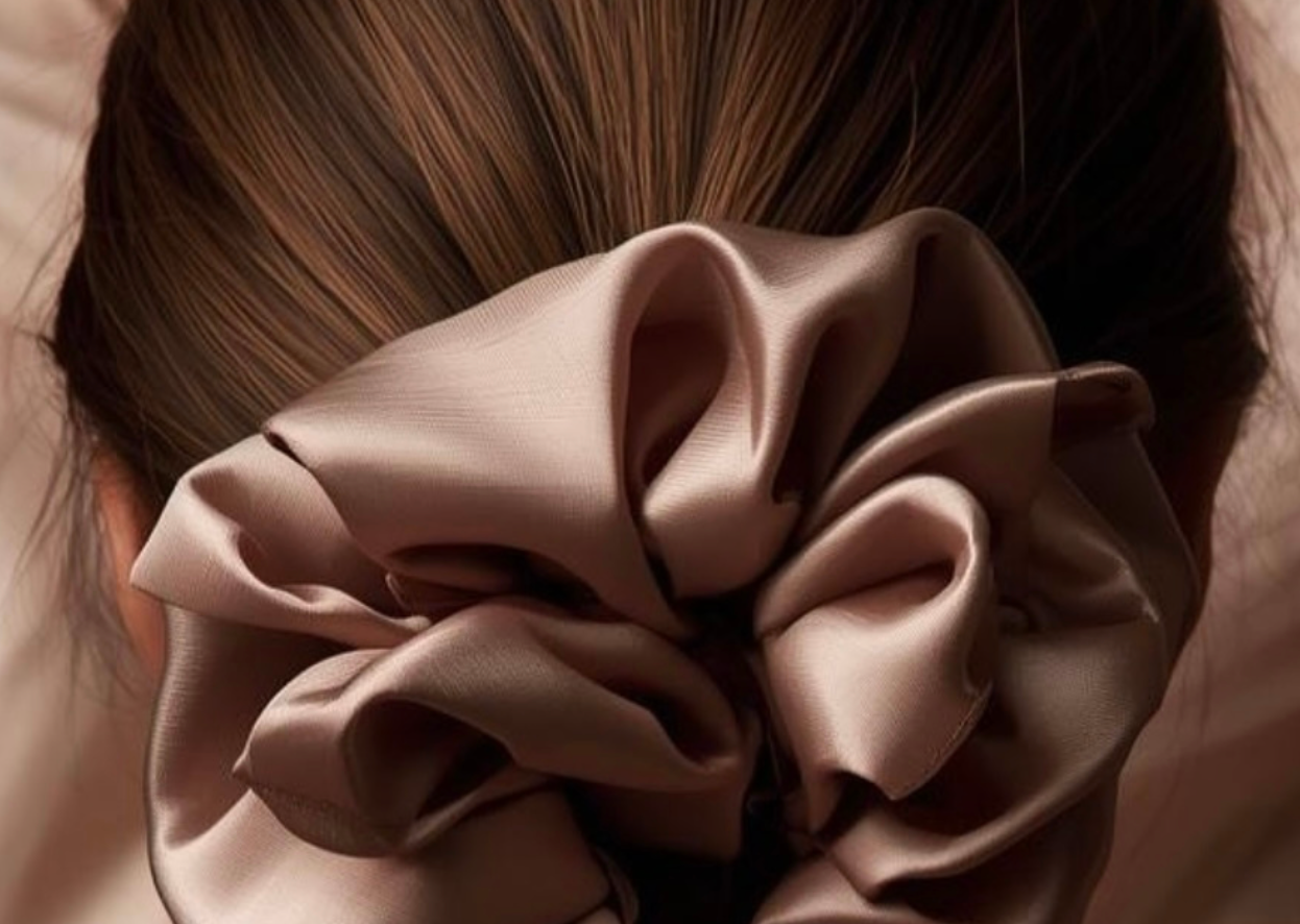 Silk fabric texture — the material at the heart of SoieScents